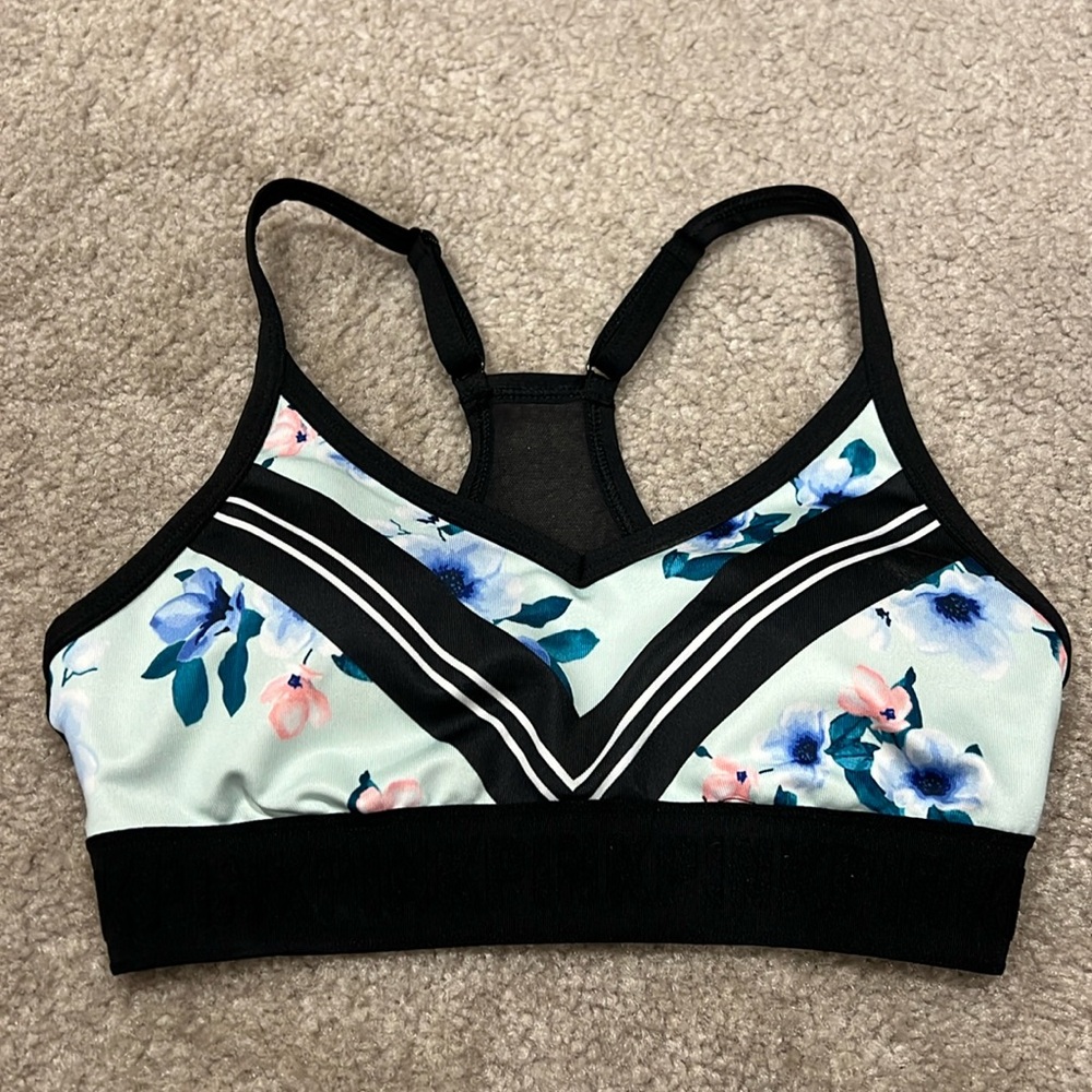 Pink Ultimate lightly lined sports bra